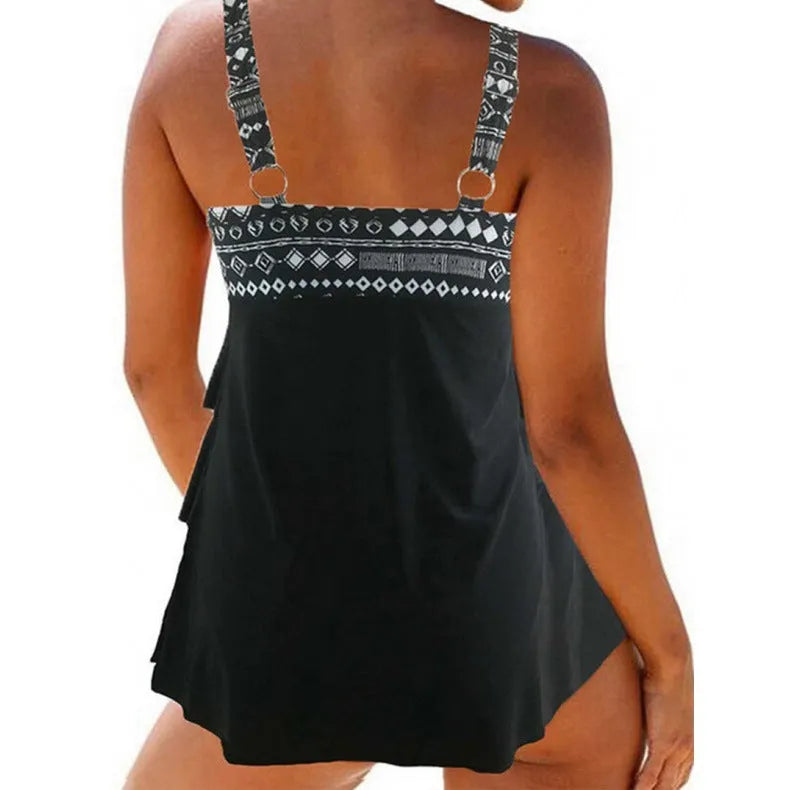 Women's plus size swimsuit with double shoulder straps and a bow, shown in picture colour.
