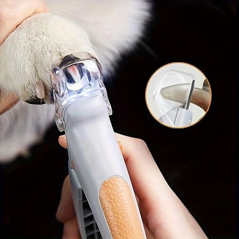 Yellow LED pet nail trimmer with magnifying glass, showing steel blades and on/off switch.