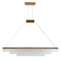 Modern clear glass pendant lamp with iron fittings hanging from a ceiling.
