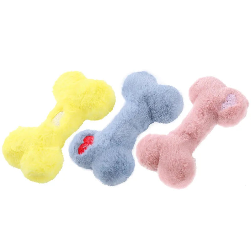 Plush love bone dog toy with squeaker in blue, pink, or yellow colours for interactive play