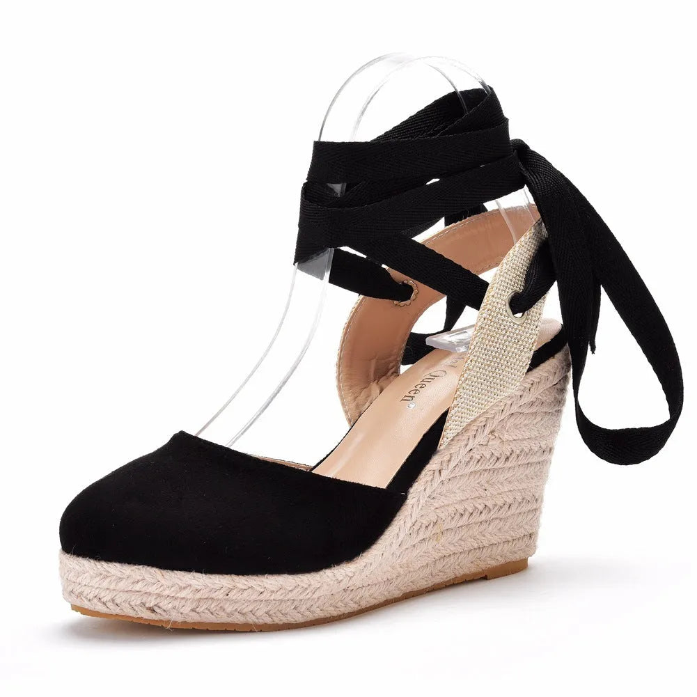 Women's apricot bohemian wedge sandals with round toe, buckle strap, and beaded tassel decorations.