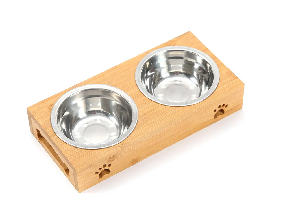 Solid wood pet dining table with stainless steel bowls in elevated feeding station design