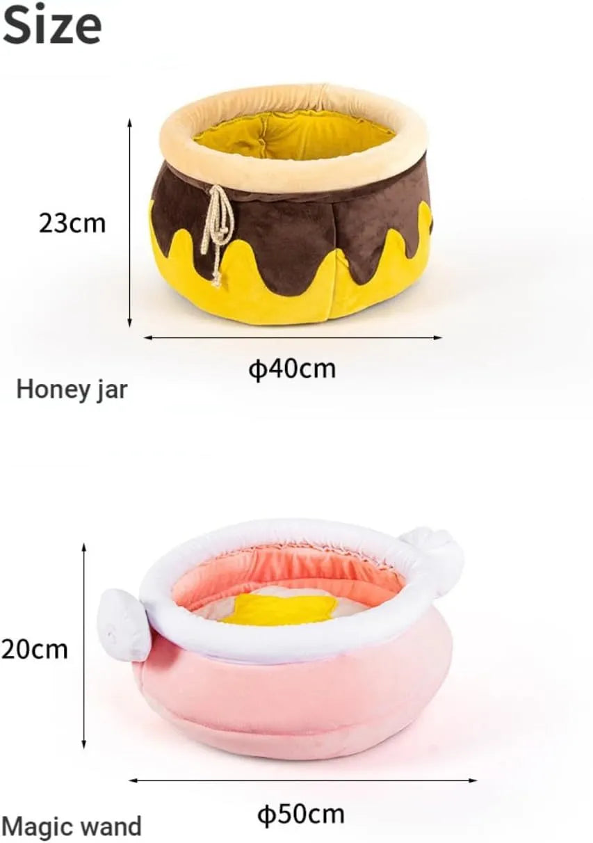 Pink honey pot-shaped enclosed cat sofa bed with a soft fabric exterior and a removable cushion.