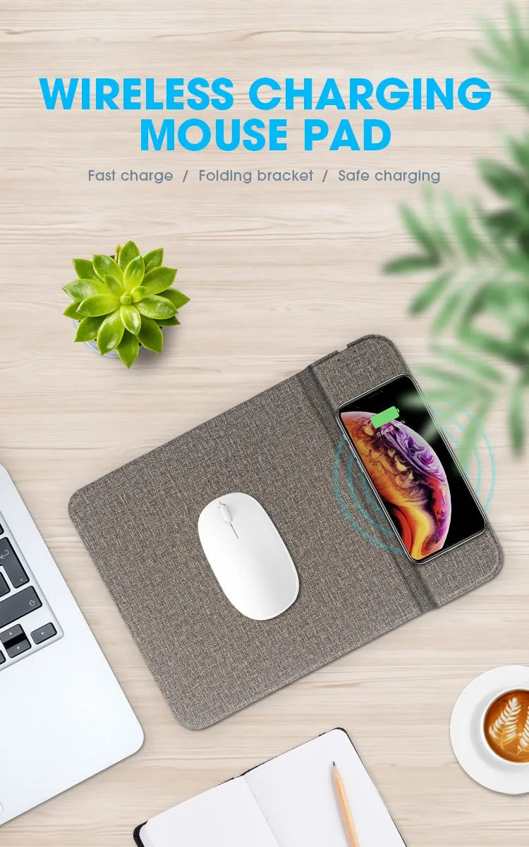 Black foldable fabric wireless charging phone holder standing upright on a desk.