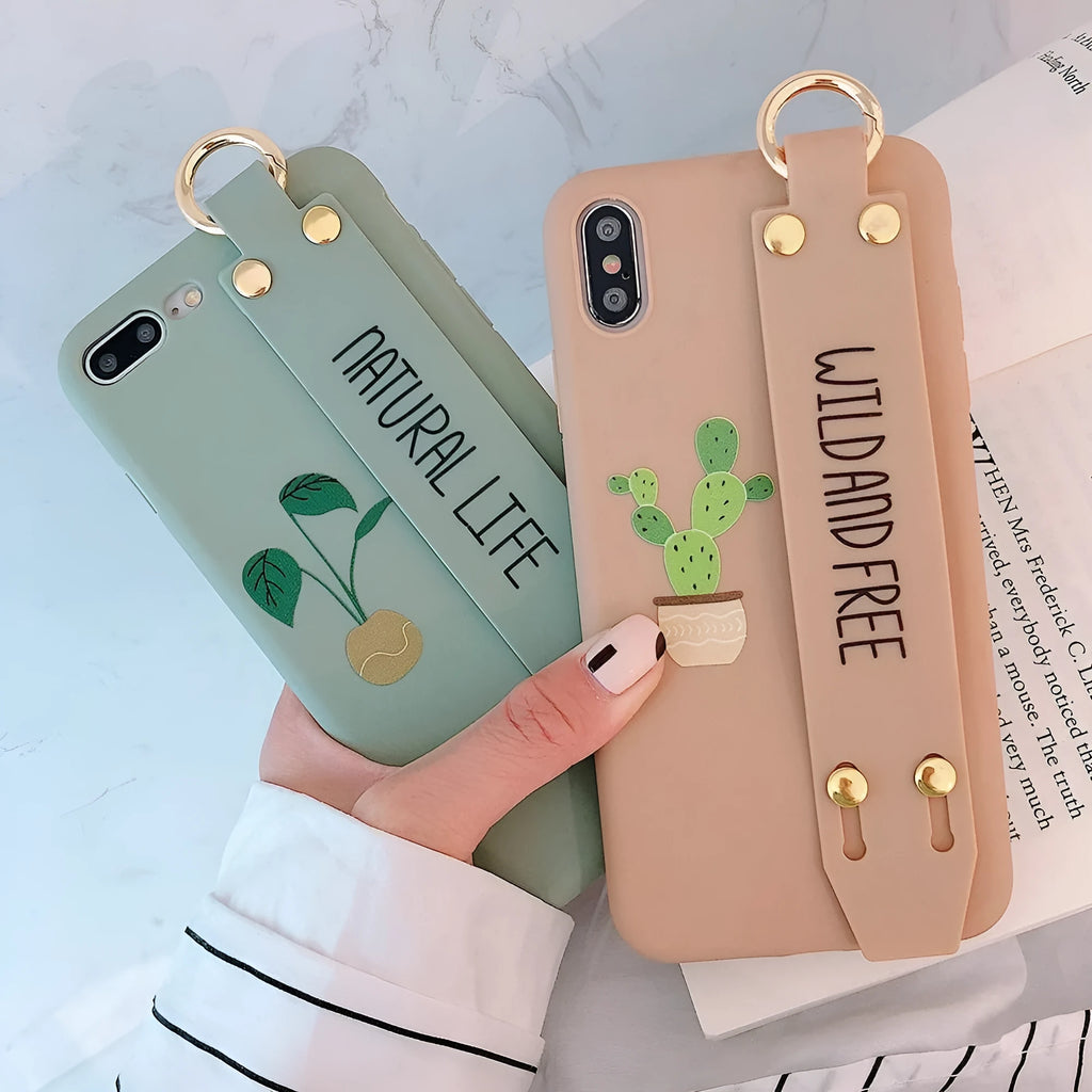 Green graffiti design wristband holder phone case for iPhone showing integrated strap and precise port cutouts