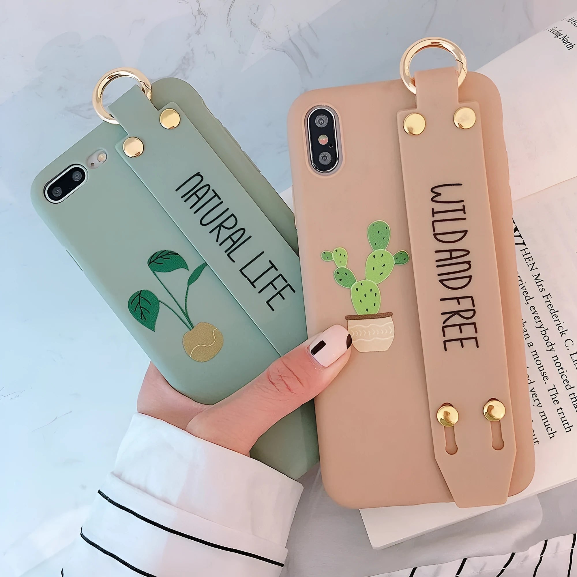 Green graffiti design wristband holder phone case for iPhone showing integrated strap and precise port cutouts