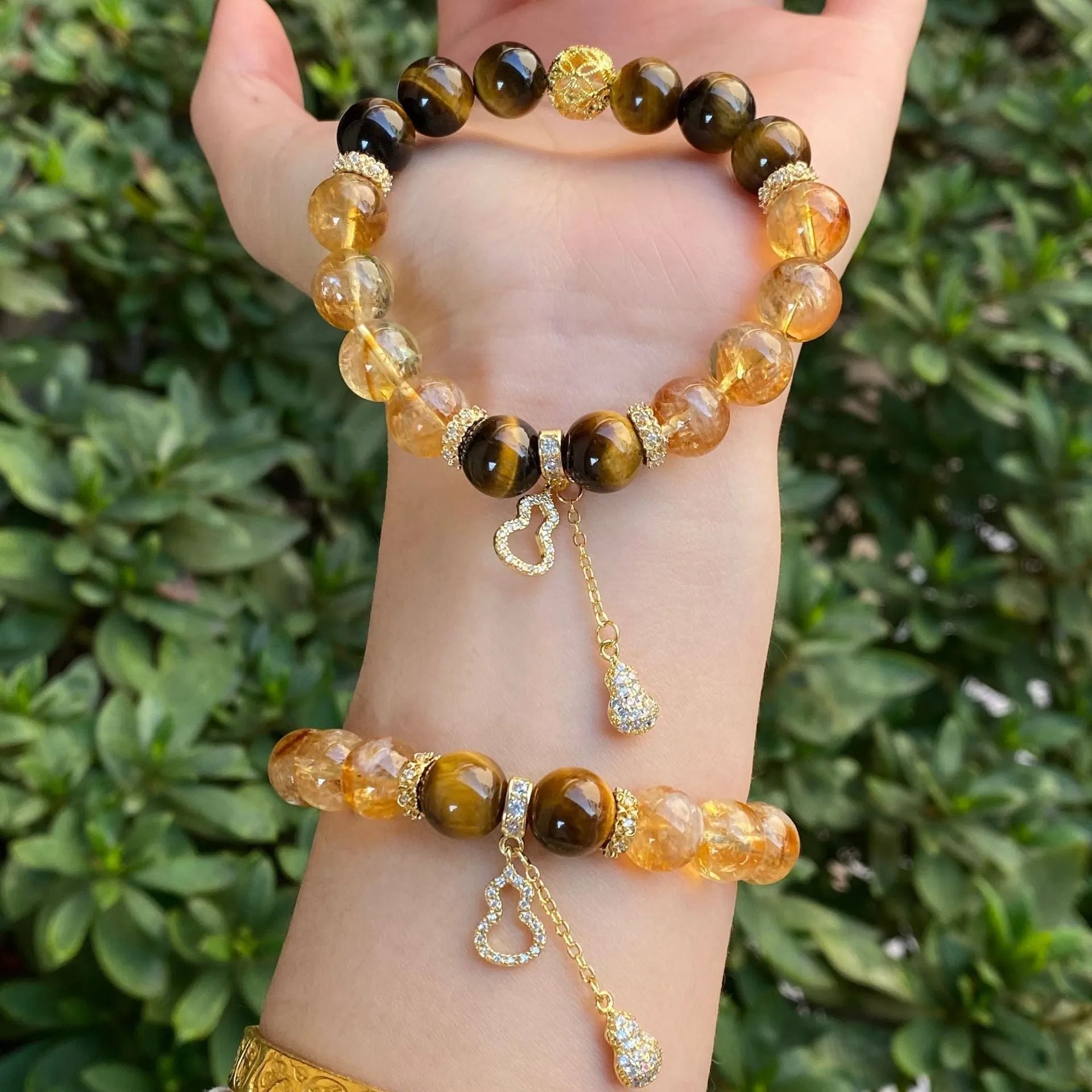 Handmade crystal bracelet with diamond gourd, topaz stones, and electroplated finish showing 8mm and 10mm components