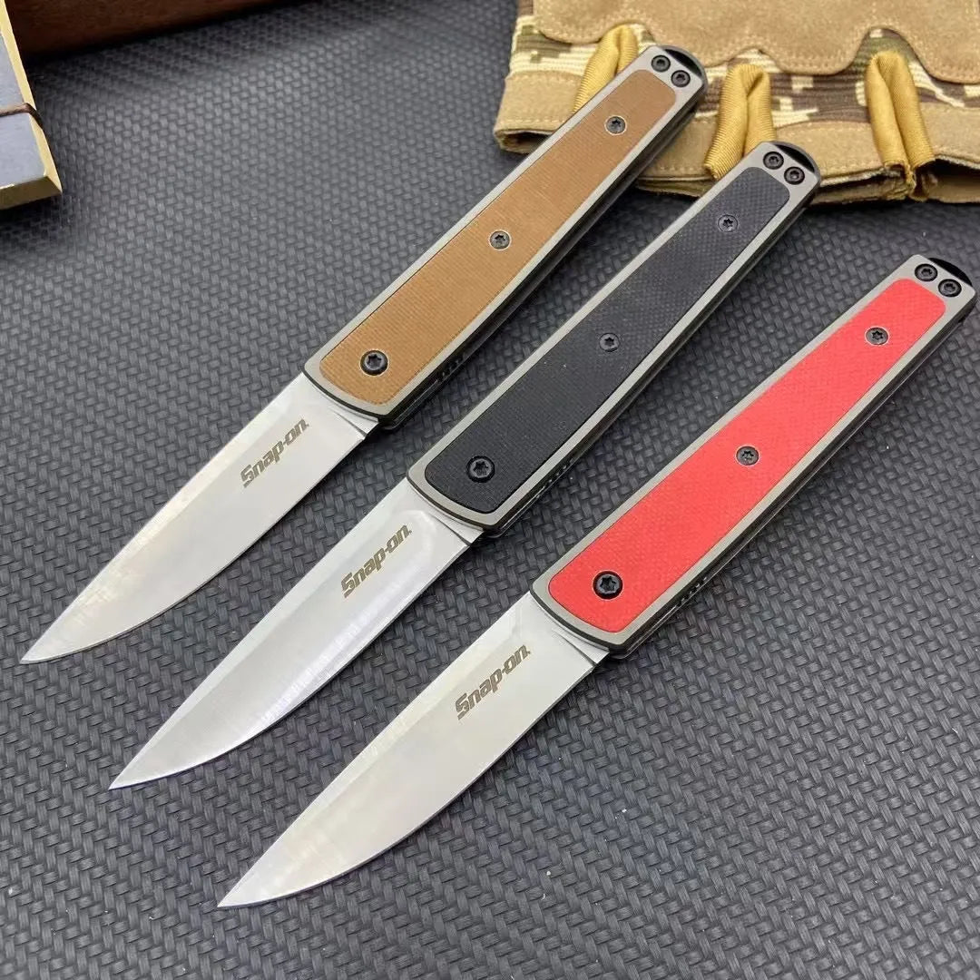 Folding fruit knife with stainless steel blade in black, brown, or red colour options showing 17cm length