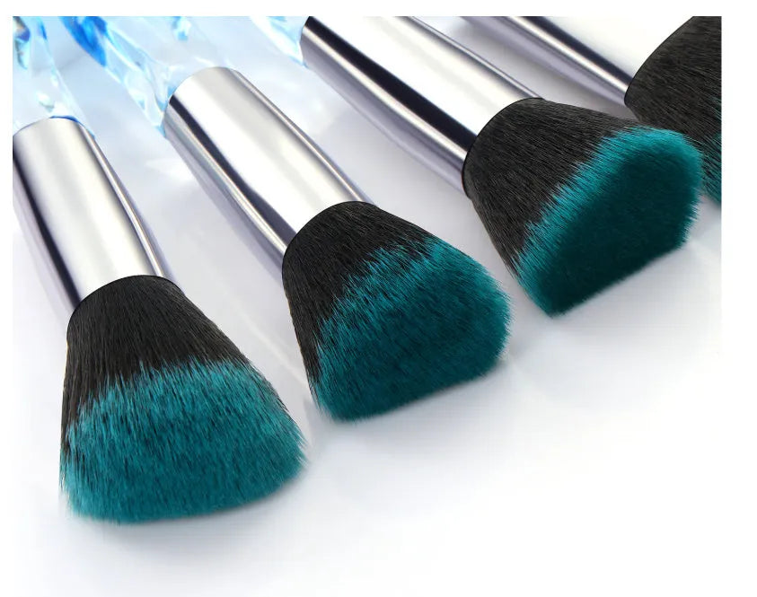 10 crystal handle foundation brushes with artificial fibre bristles in black, blue, red, and yellow colours