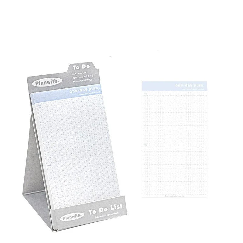 Portable standing Post-it notes in green blank, purple line, blue blank, and gray line colours