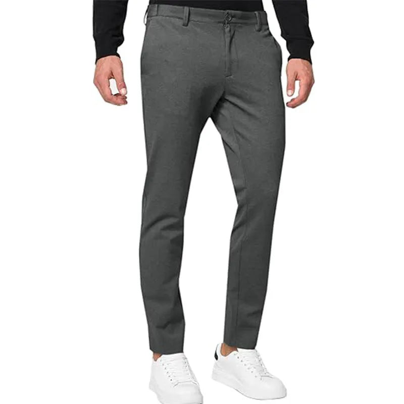 Men's slim-fit tapered chino trousers in a grey cotton blend fabric with a zipper fly.