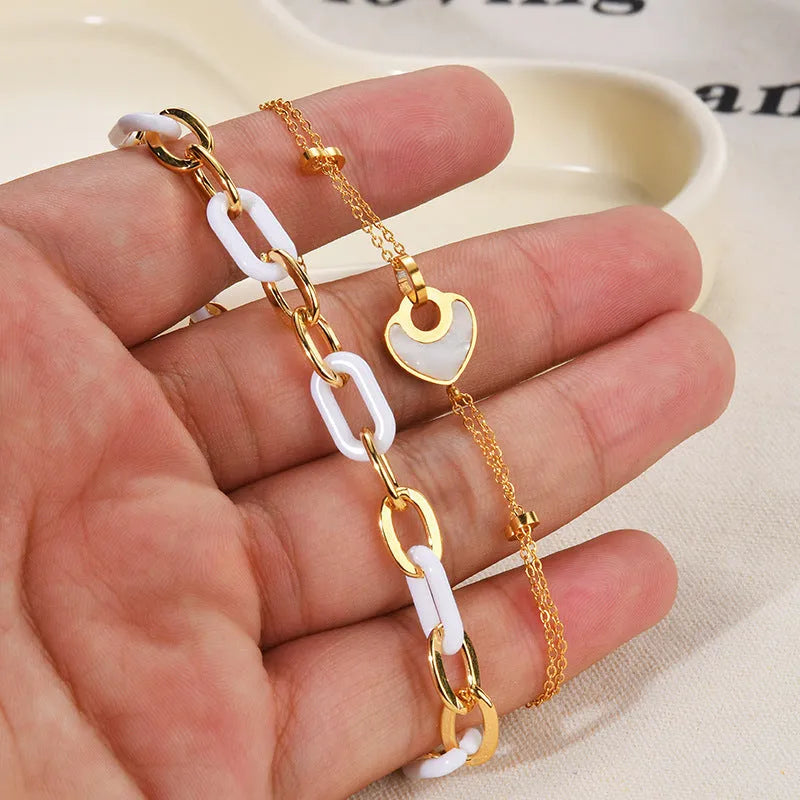 Stainless steel and resin double-layer heart bracelet for women in ins style.