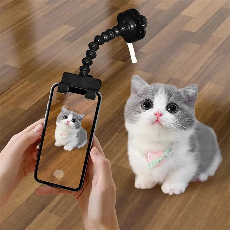 Black plastic pet photography phone holder with clip for dog or cat treats