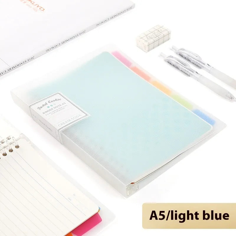 Refillable loose-leaf spiral notebook in B5 size with a pastel blue PP cover and lined pages.