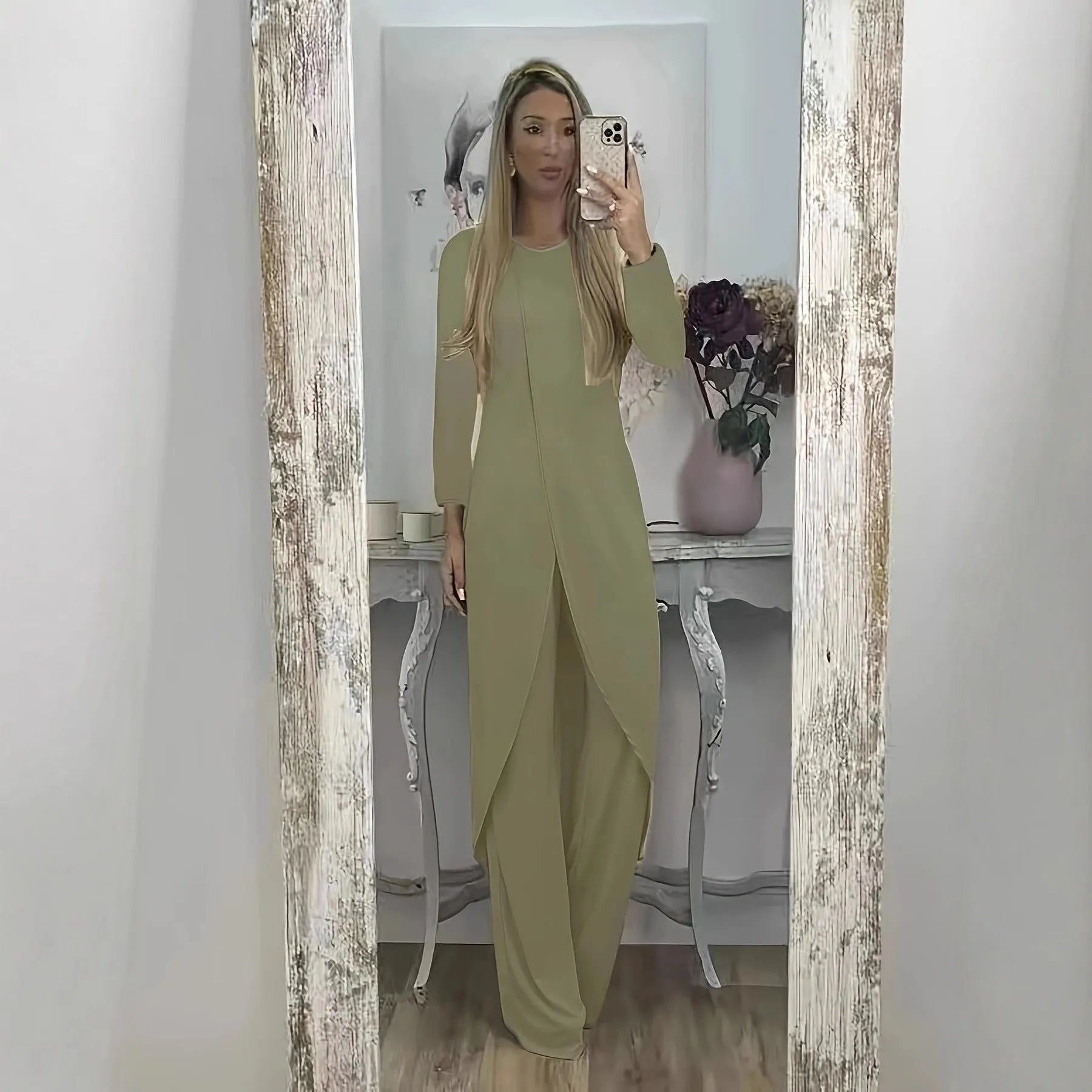 Women's casual two-piece lounge set showing long sleeve top and trousers in loose fit
