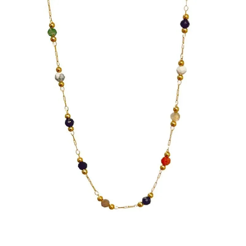 Gold coloured titanium steel necklace with an O-ring chain and a natural stone pendant.