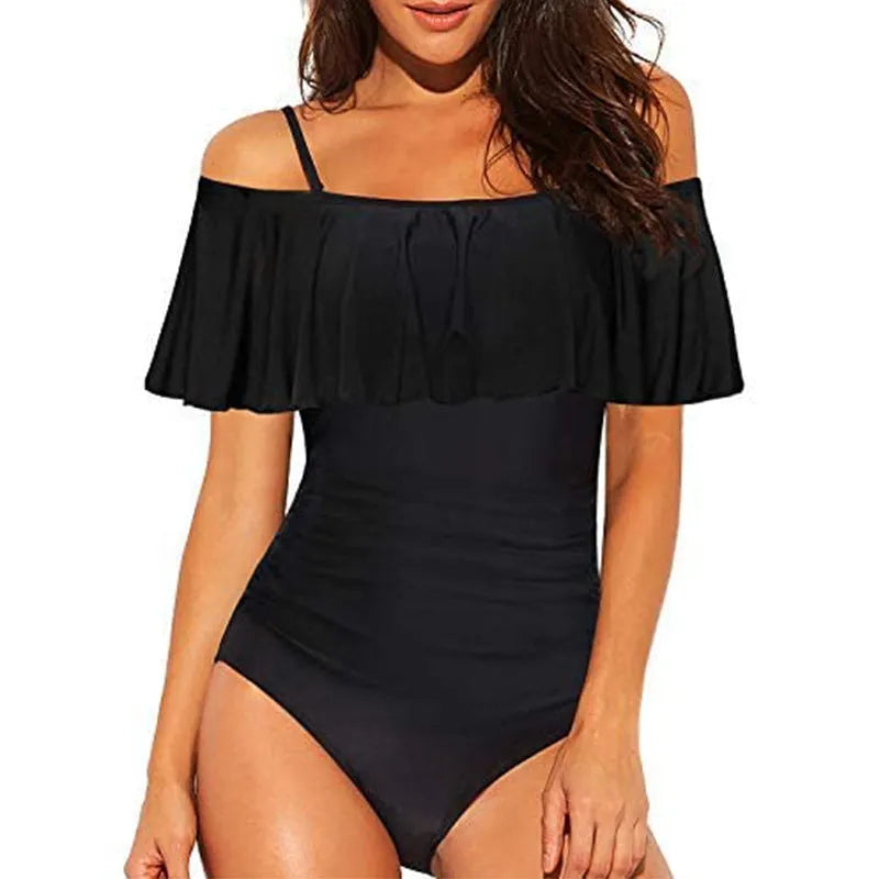 Black one-piece women's swimsuit with cut-out design and ruffled tube top straps