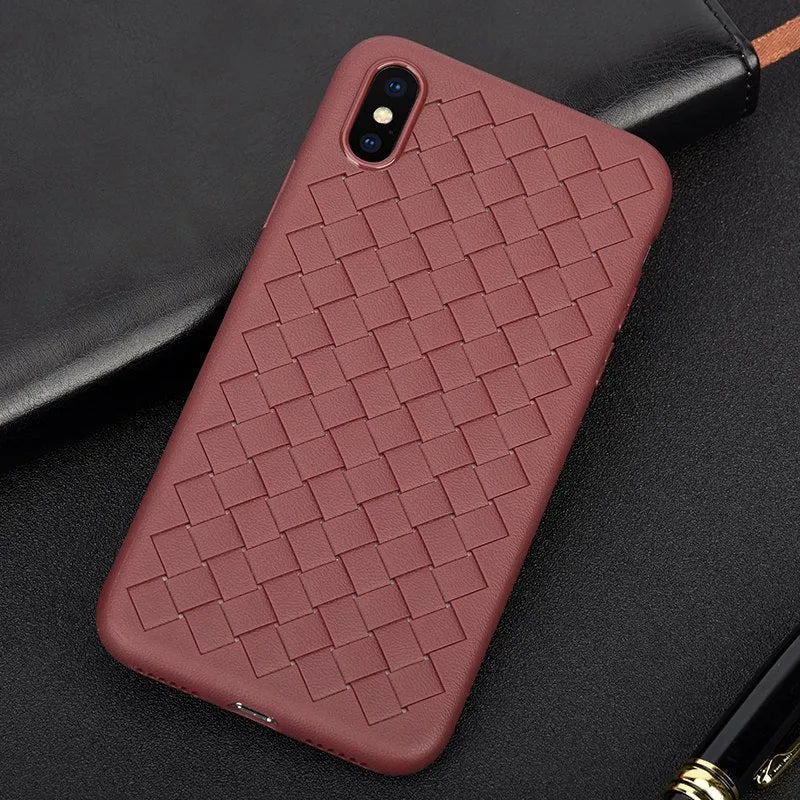 Luxury grid weaving protective case for iPhone on a table, showing raised lips and colour options.
