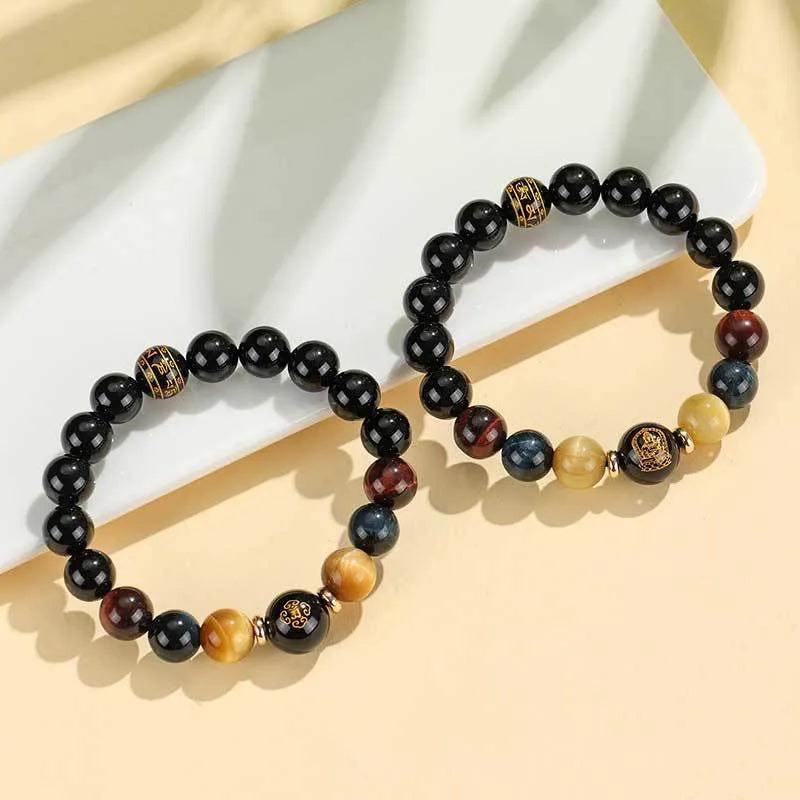 Black agate zodiac animal beaded bracelet with gold, blue and red tiger eye stones
