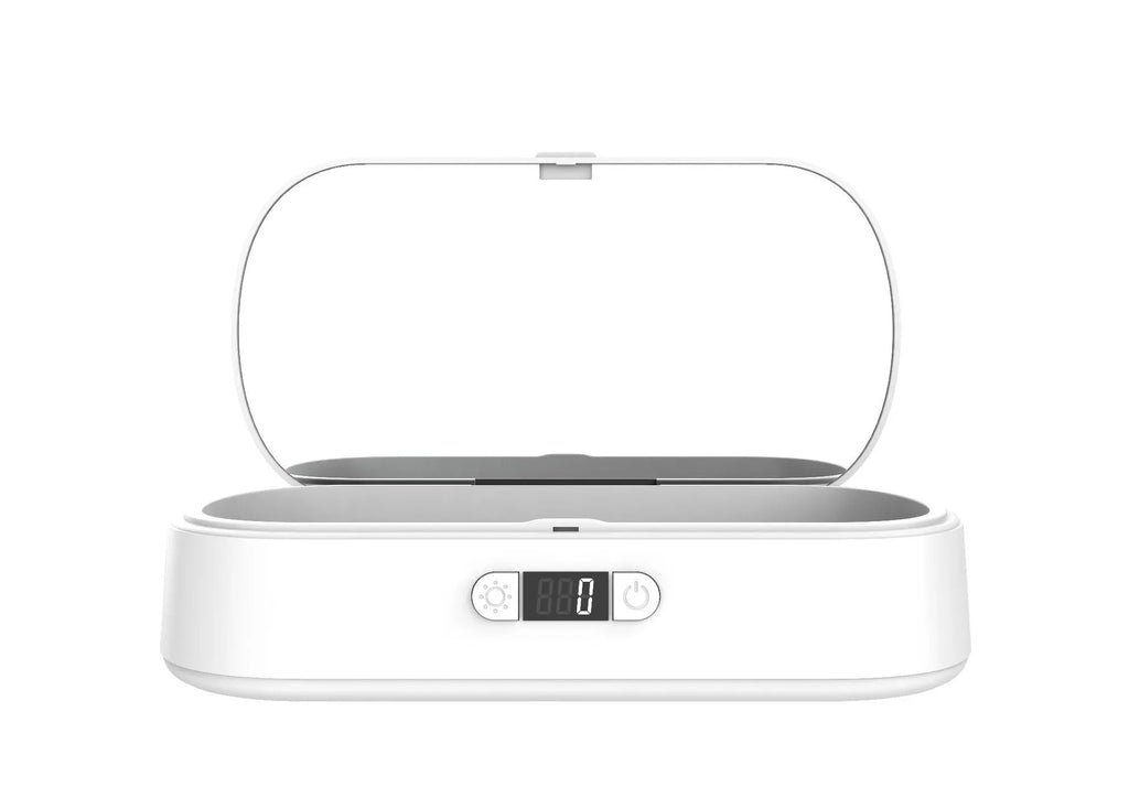 White UV steriliser and wireless charging box for mobile phones and small items
