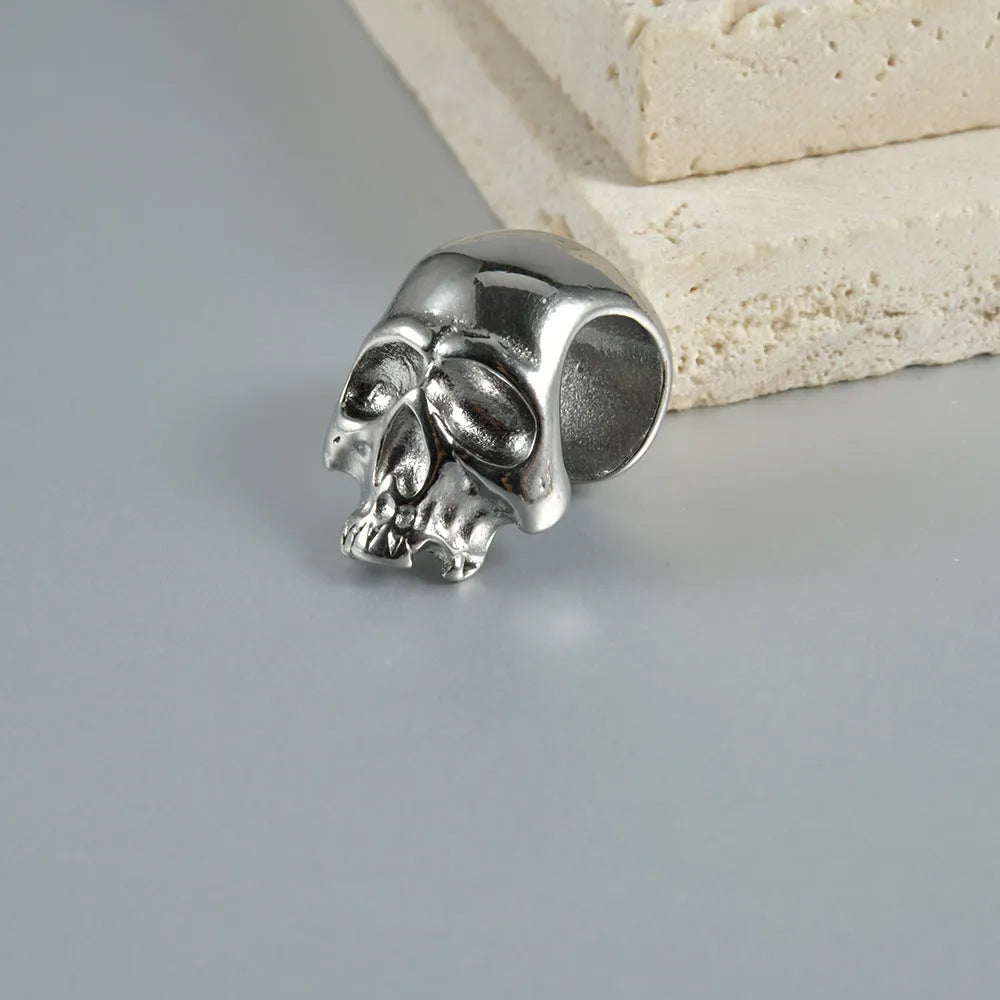 Personalised stainless steel hollow skull Buddha geometric earring in gold electroplate.