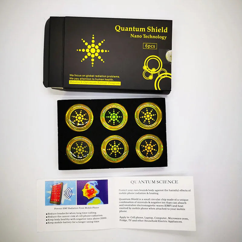 Six anti-radiation mobile phone stickers in gold and silver colours with negative ion energy