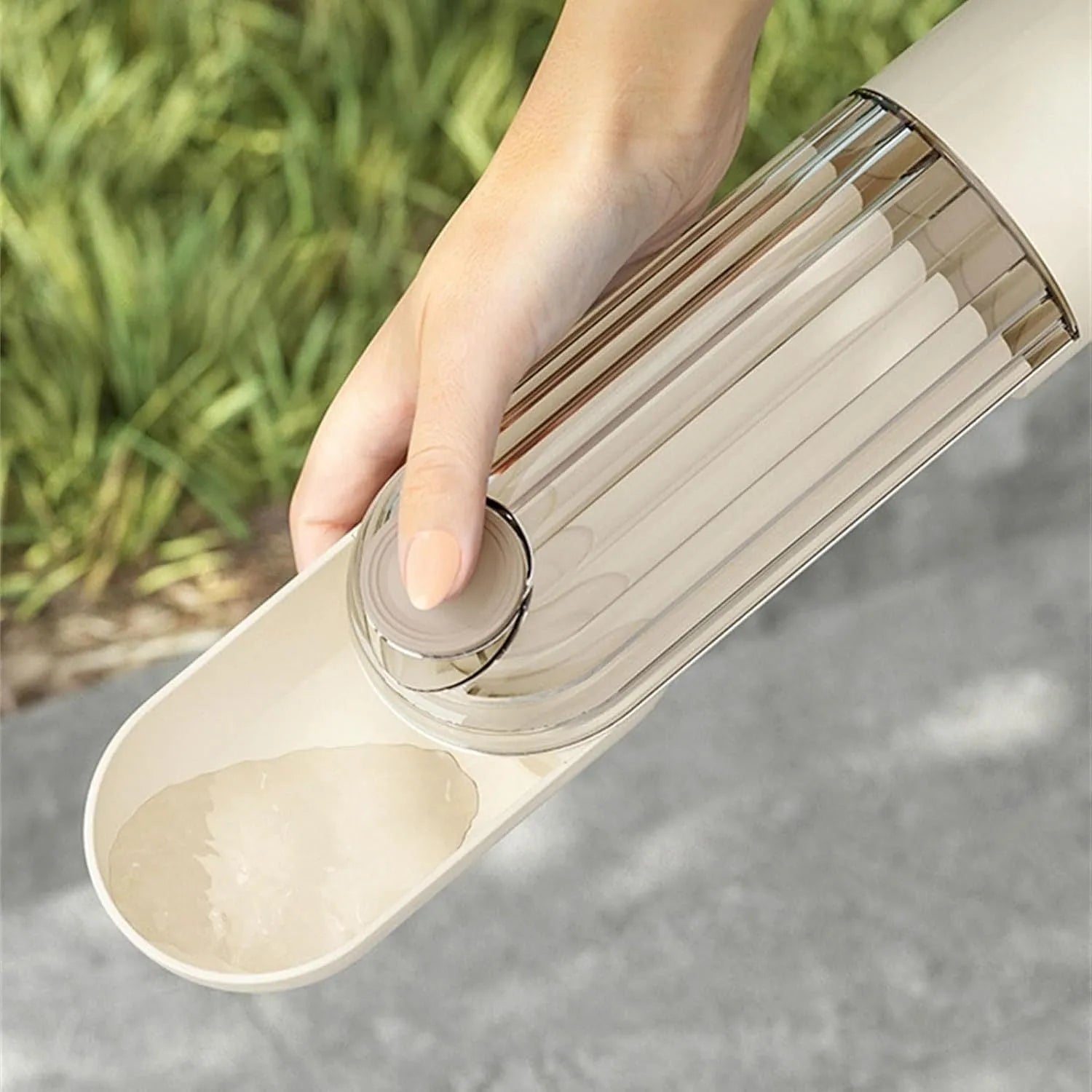 Beige foldable dog water bottle with food dispenser base shown extended and compressed