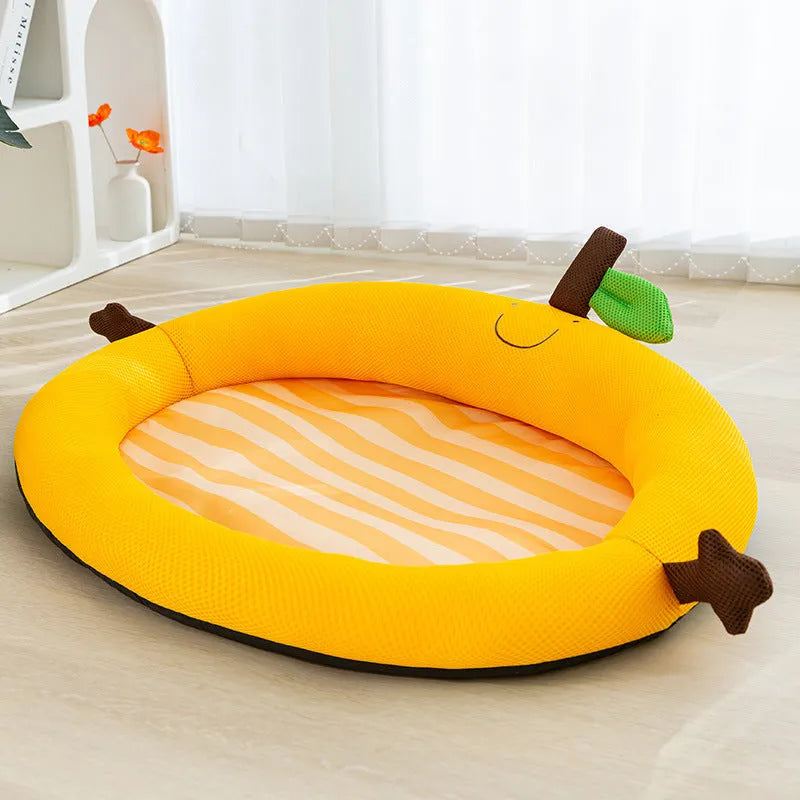Green fruit-shaped pet nest mat with raised backrest for a cat or small dog.