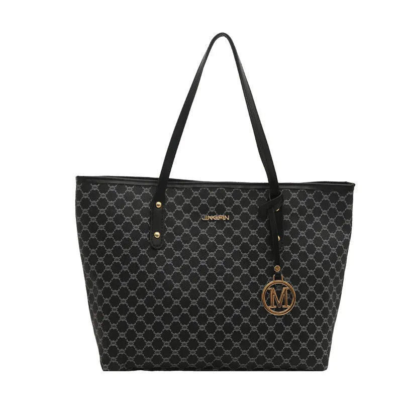 Black PU street-trend shoulder bag with sewing thread detail, shown with a 42cm wide top opening.
