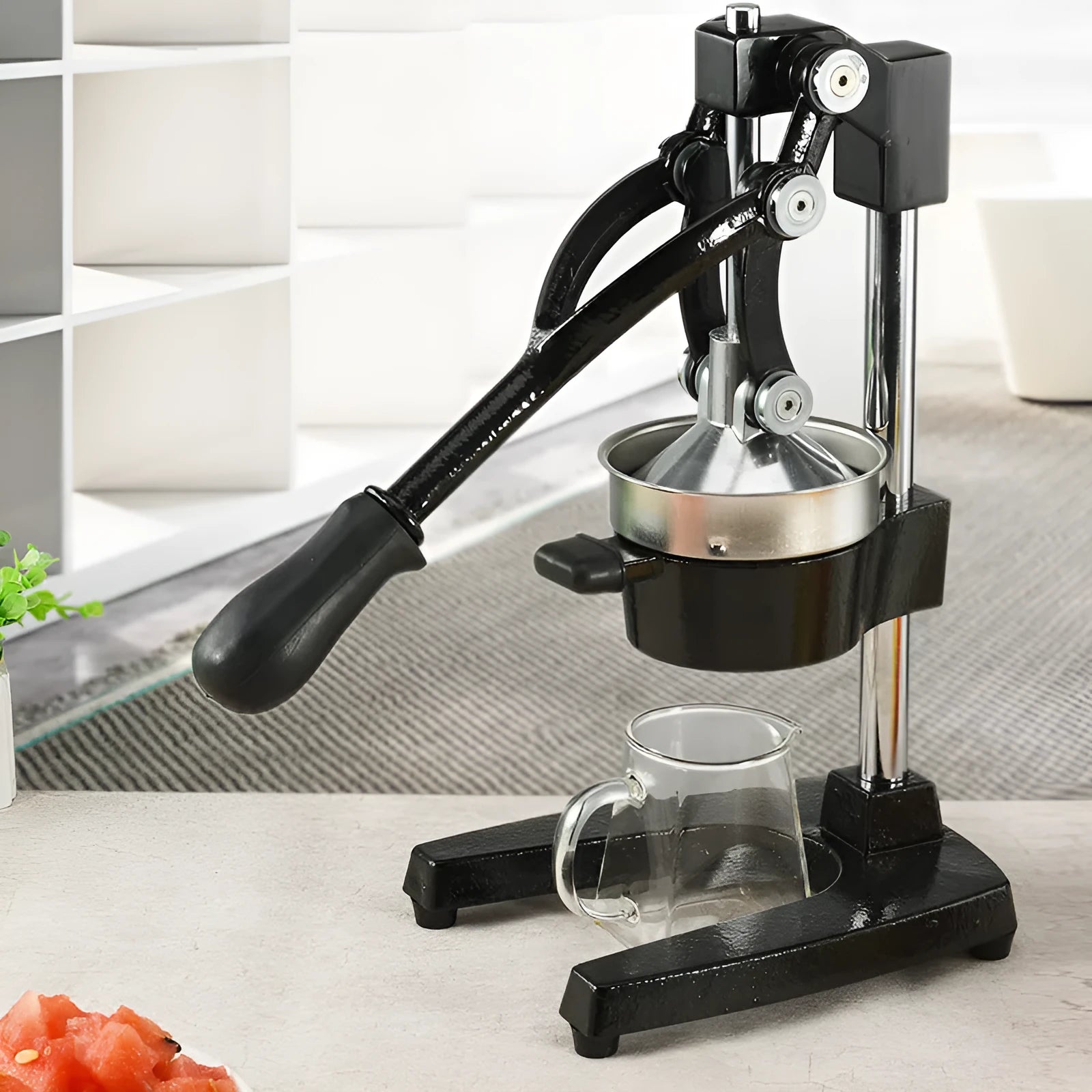 40cm tall black manual cast iron juicer with stainless steel funnel