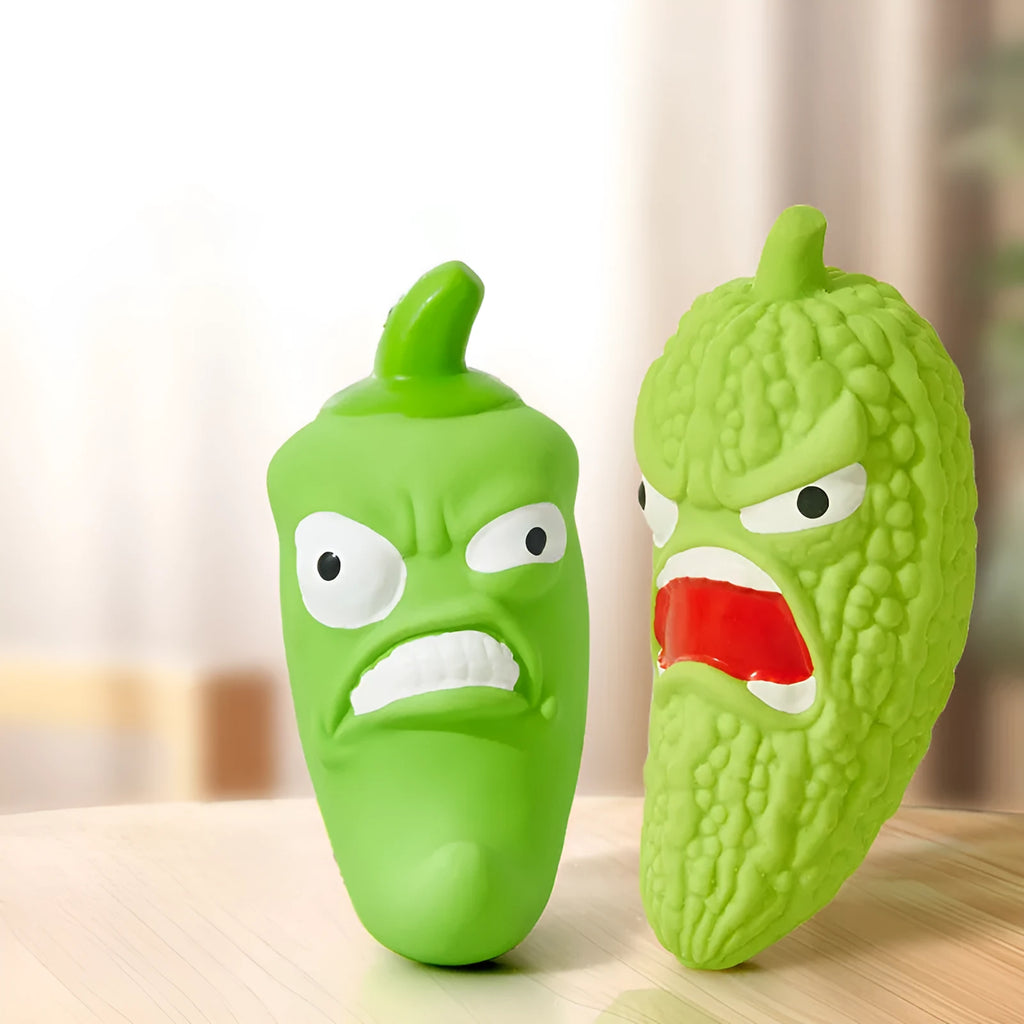 Bitter gourd or chilli shaped dog chew toy with textured surface for tooth cleaning and integrated sound.