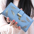 Women long wallet with hollow leaves design, soft PU surface, zipper closure, apricot colour, multiple compartments