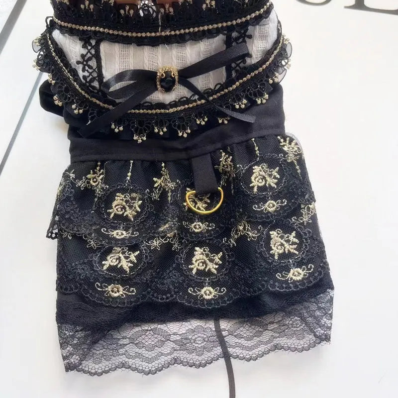 Golden gothic-style skirt for a small dog or cat on a mannequin, showing princess design.