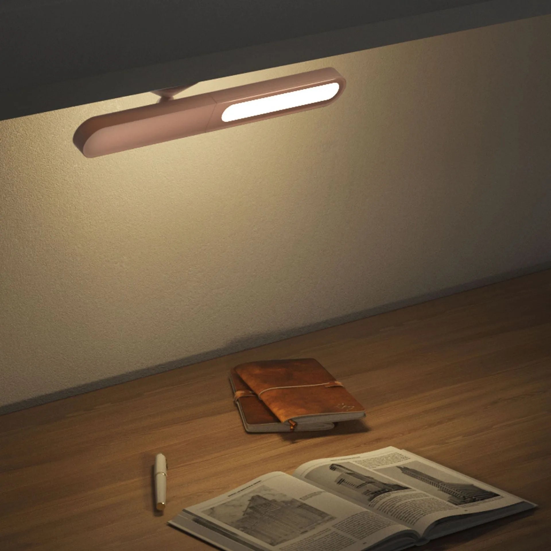 White geometric desk lamp with magnetic base mounted on a metal wall surface.