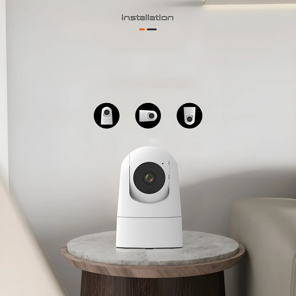White indoor pan tilt security camera with lens on a compact square base, showing remote movement and two-way audio features.