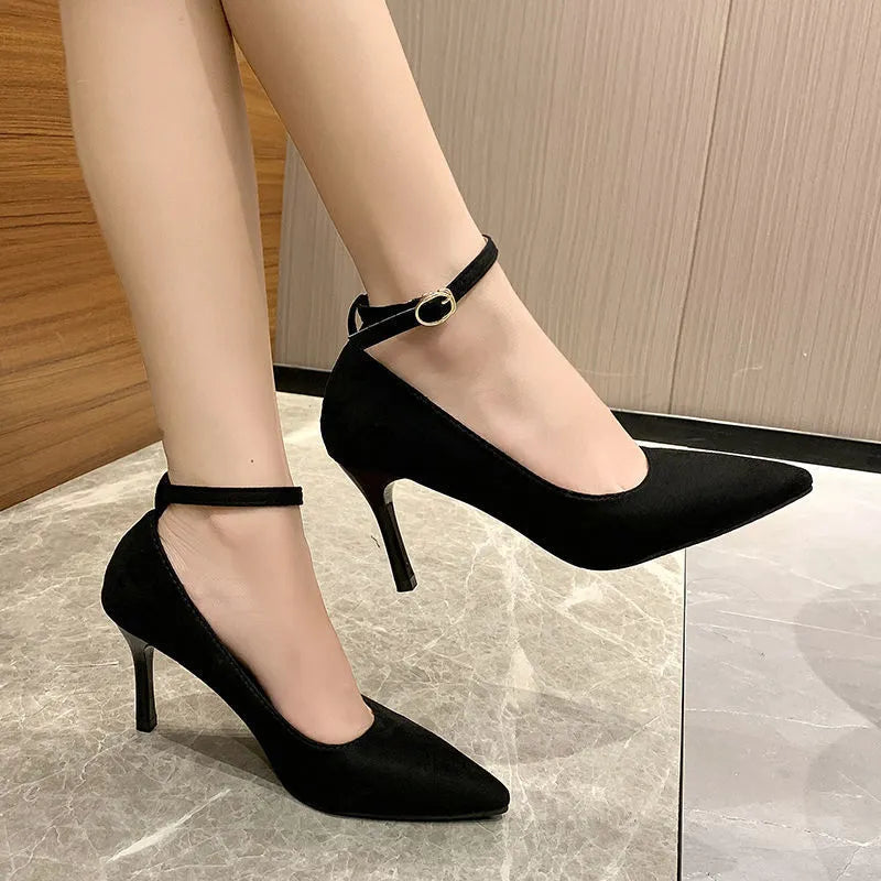 Women's black stiletto heel pump shoes with buckle detail and 8cm heel