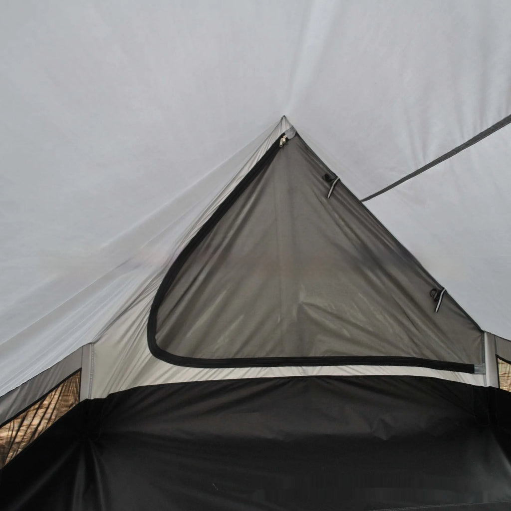 Brown and white pole-free A-line cabin tent for 2-3 people shown pitched with hiking poles.