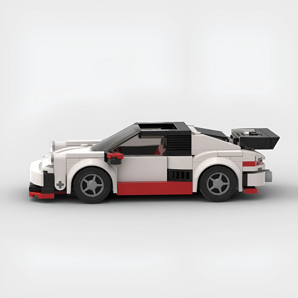 Small particle plastic building block set assembled into a sports car moc puzzle cool convertible car model showing the M10231 colour option