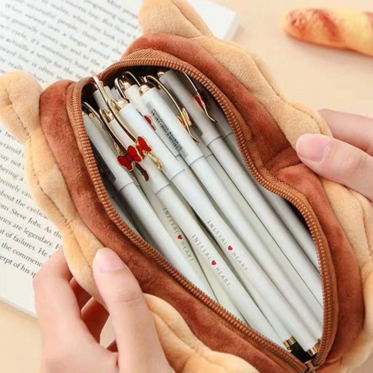 Plush sandwich biscuit pencil case in soft cartoon design for school stationery storage