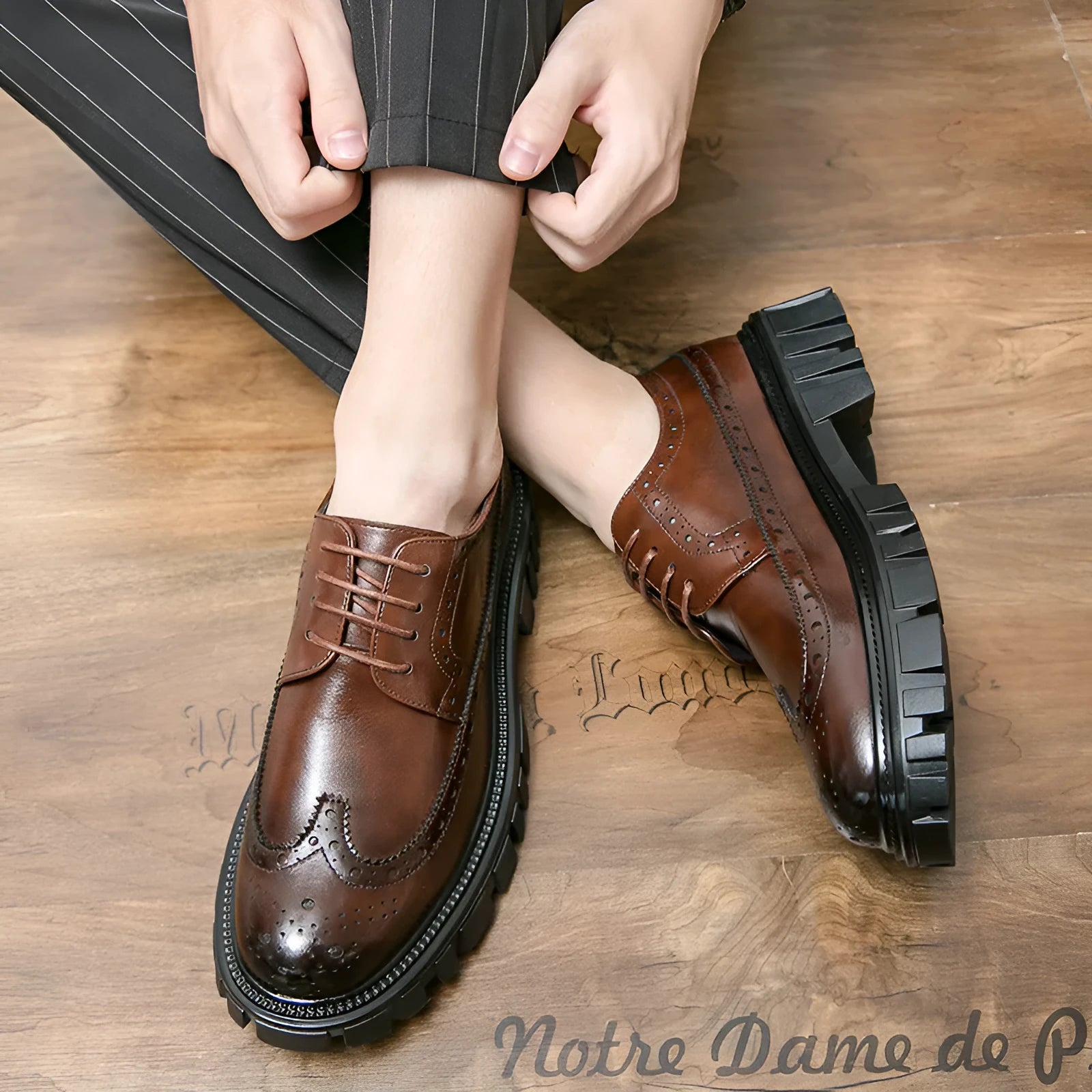 Men's black and brown business brogue shoes with round toe design and artificial leather construction