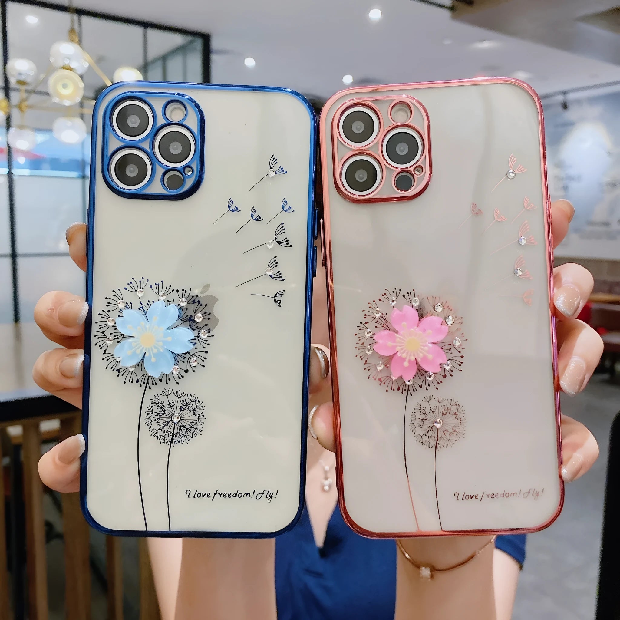 Green iPhone case with 3D floral design and extended kickstand on a table