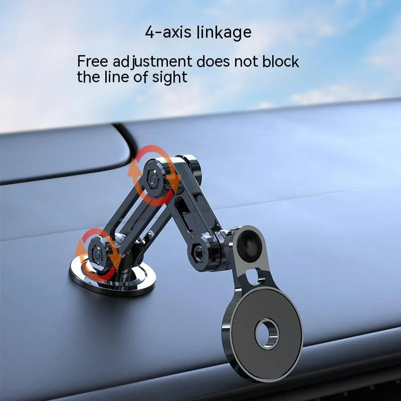 Black magnetic car phone holder mounted on dashboard with phone attached