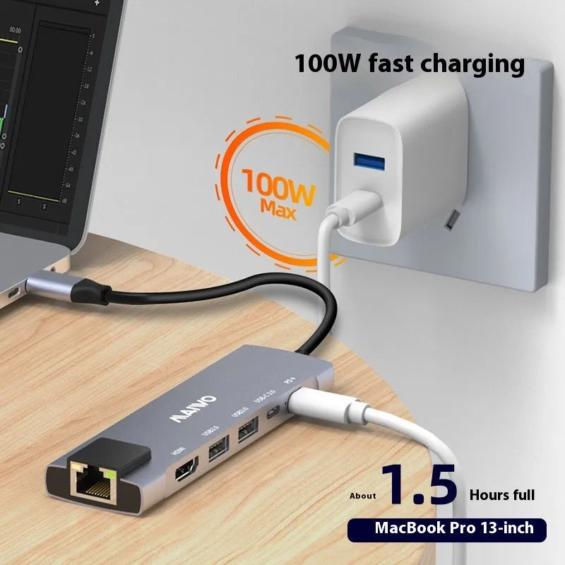 Aluminium six-in-one Steam Deck docking station showing USB, HDMI, and Ethernet ports.