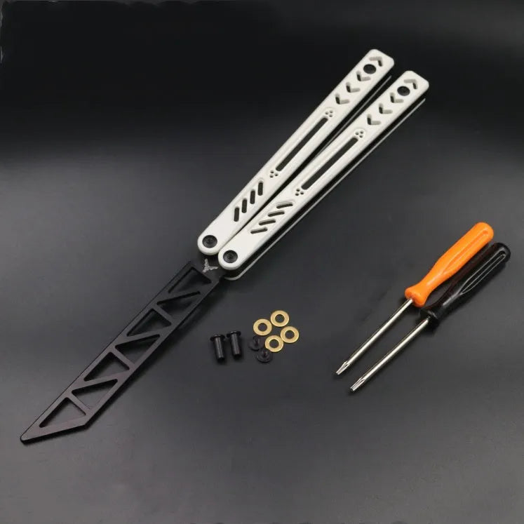 Aluminium handle unbladed butterfly knife trainer with black G10 grip patches on a blue background.