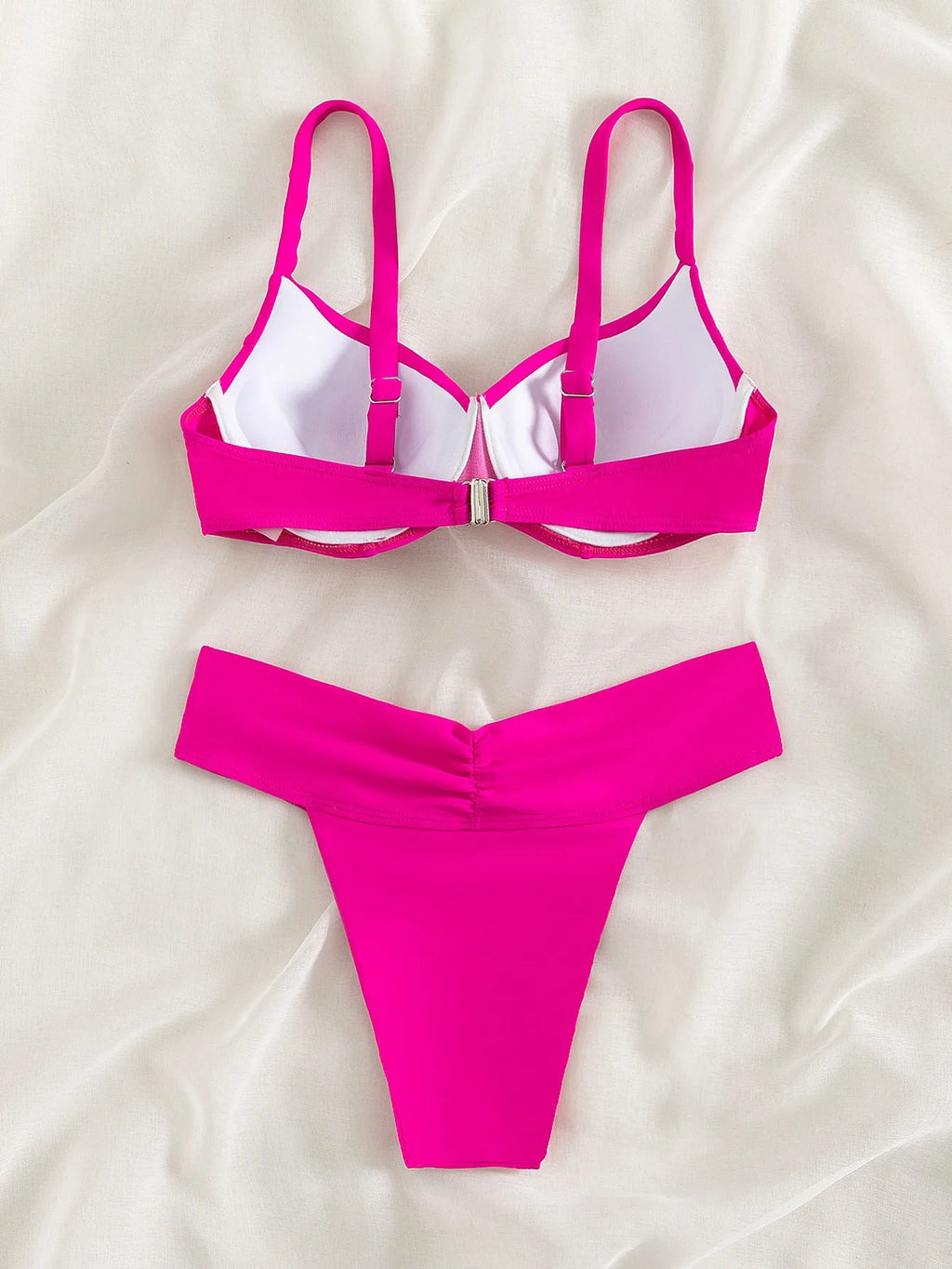 Solid colour nylon bikini swimsuit in briefs style on a white background.