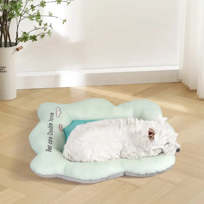 Green pet cooling mat for a medium-sized dog resting on an ice silk surface.