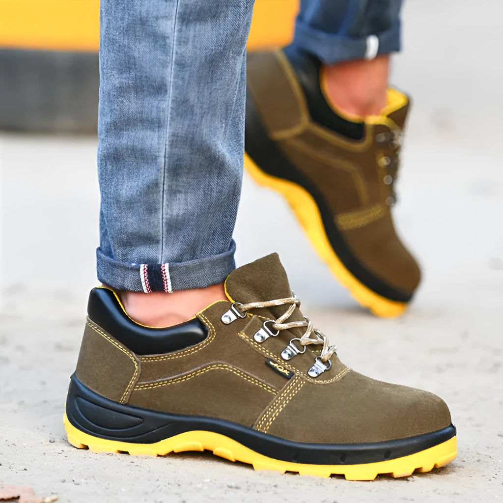 Bronze coloured cow suede leather safety shoes with a steel toe cap and low-cut design.
