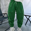 Men's blue bamboo fibre casual sports trousers with cropped length and loose fit on a hanger.