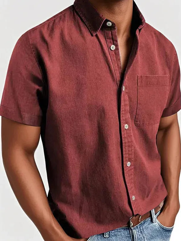 Men's solid colour short-sleeved polo shirt with a chest pocket on a hanger