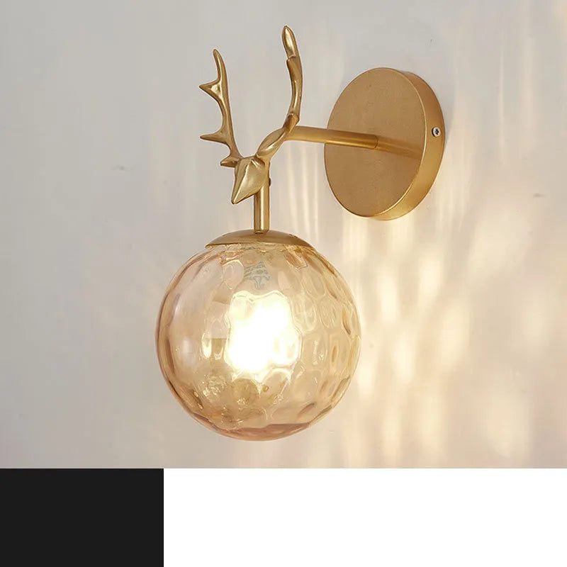 Modern round glass wall sconce with a Nordic design, mounted on a white wall, showing its light-diffusing shade and compact 30cm diameter.